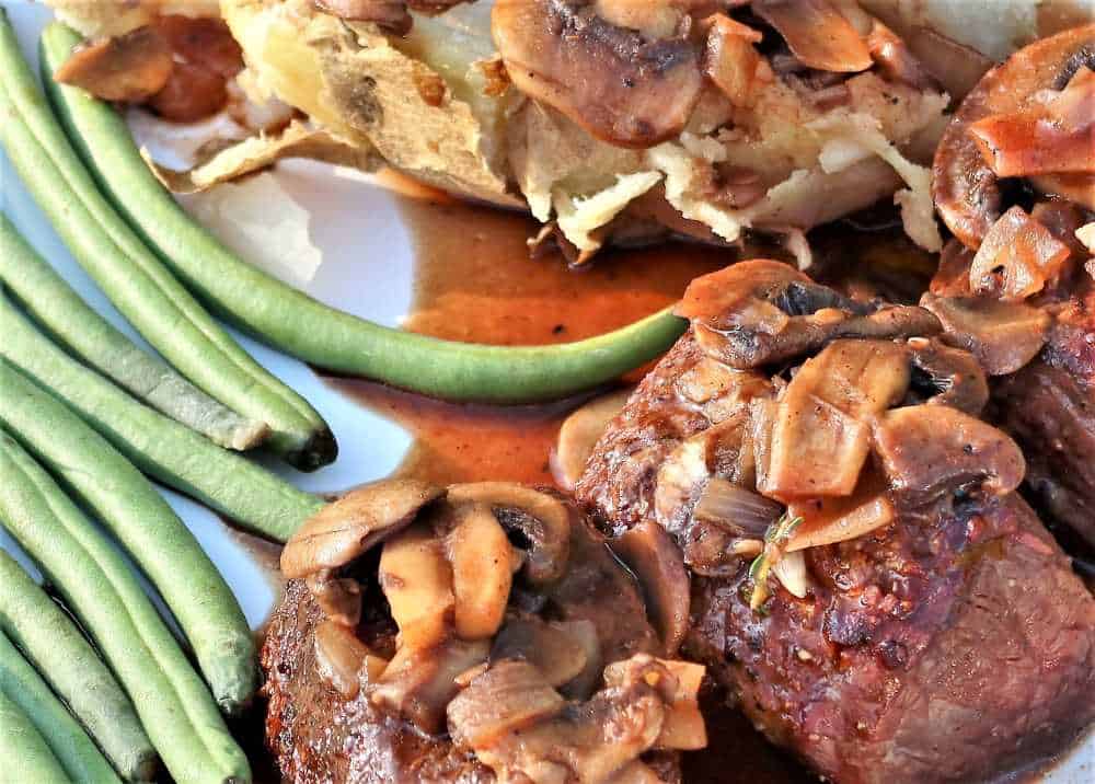 A Restaurant-Style New York Strip Steak with a Mushroom Bordelaise Sauce