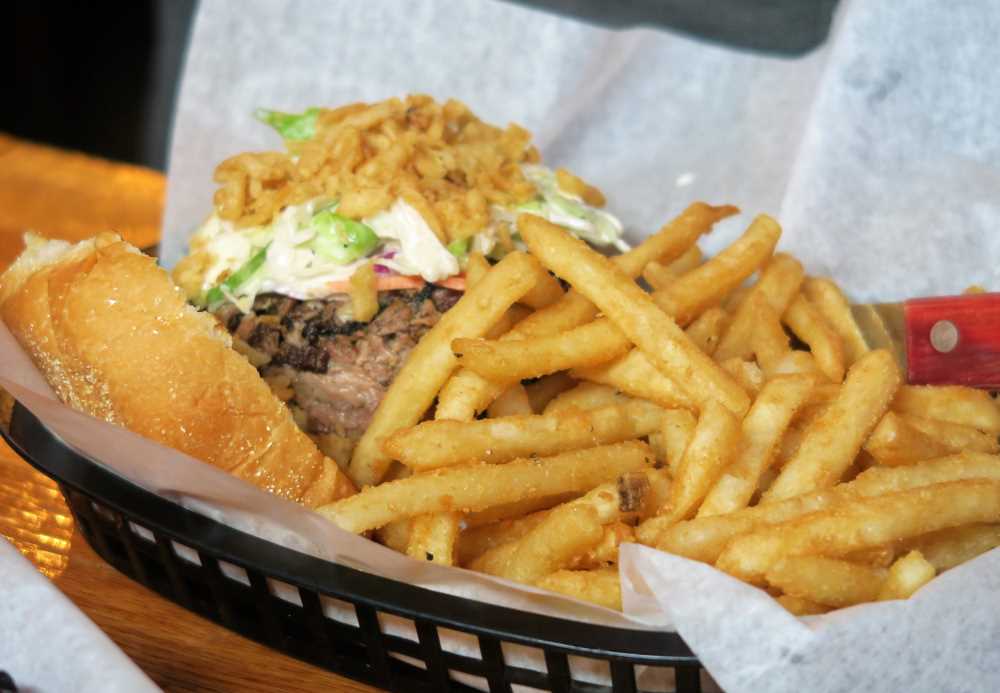 Brisket Sandwich with Fries at Meat, one of the Lansing best restaurants