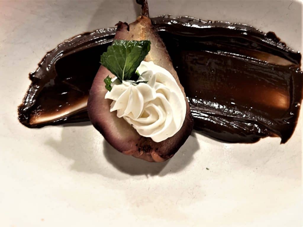 Poached Pear with Bittersweet Chocolate Sauce at Mar Vista in Long Boat Key
