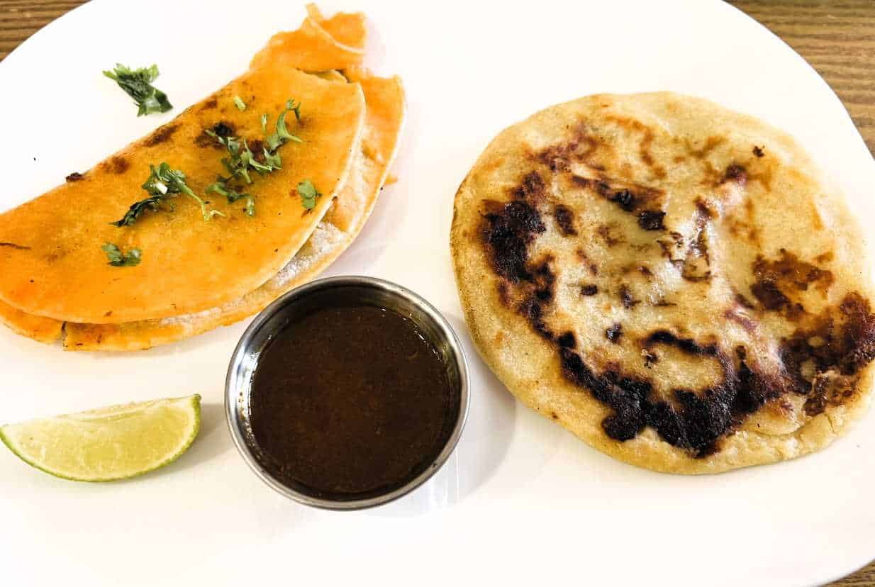Birria Taco and Pupusa at Guacamole Mexican Grill