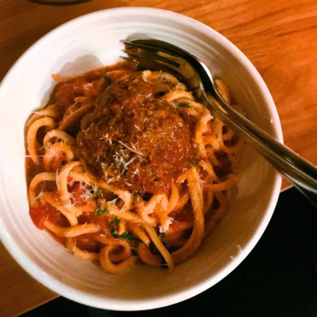 The bucatini, a hollow spaghetti-shaped pasta