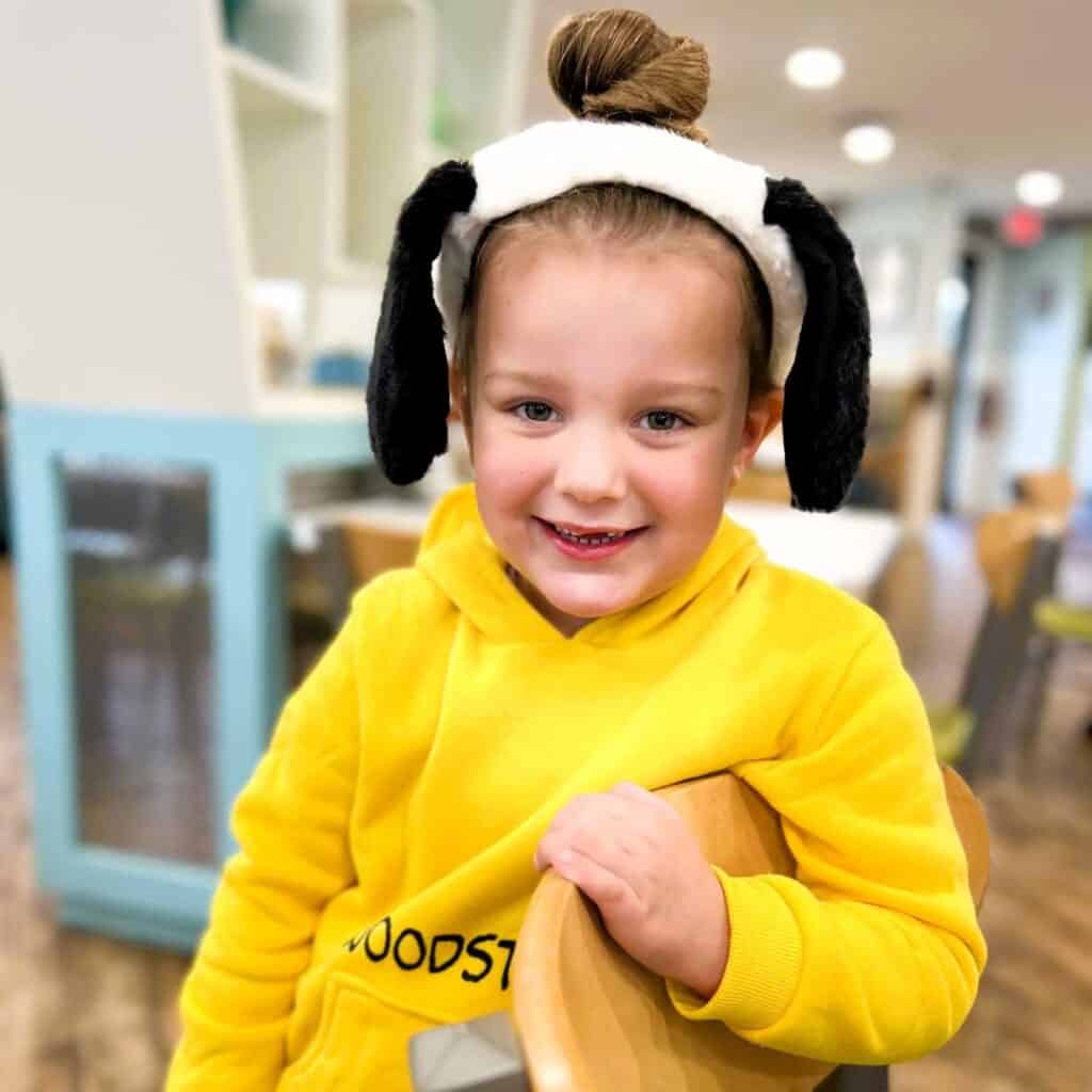 Granddaughter wearing Snoopy ears from Knott's Berry Farm in Buena Park, California