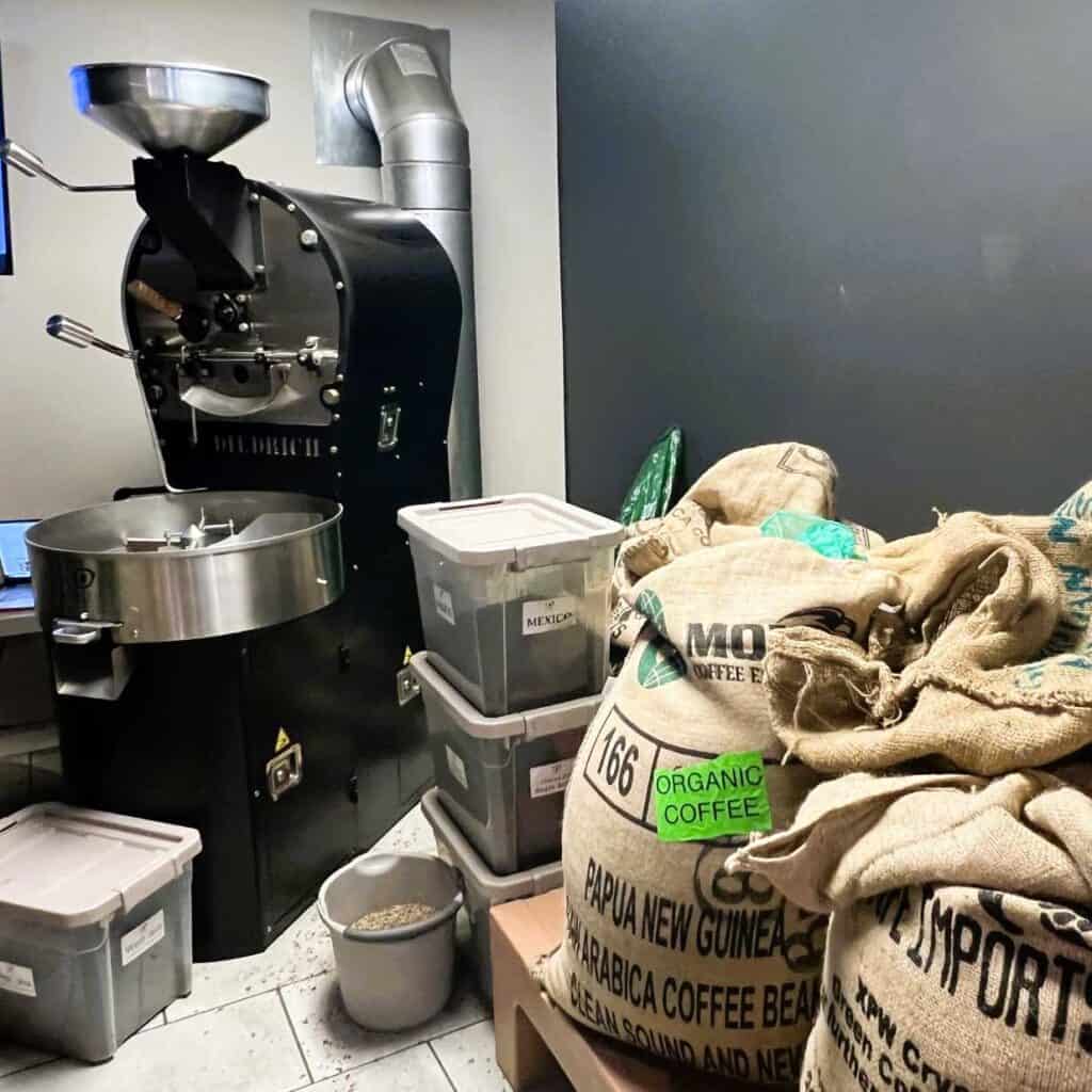 The Roaster and Beans at Owl Eye Coffee Roasters