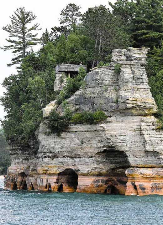 The Michigan Travel Guide includes the Pictured Rocks National Lakeshore in Michigan's Upper Peninsula.
